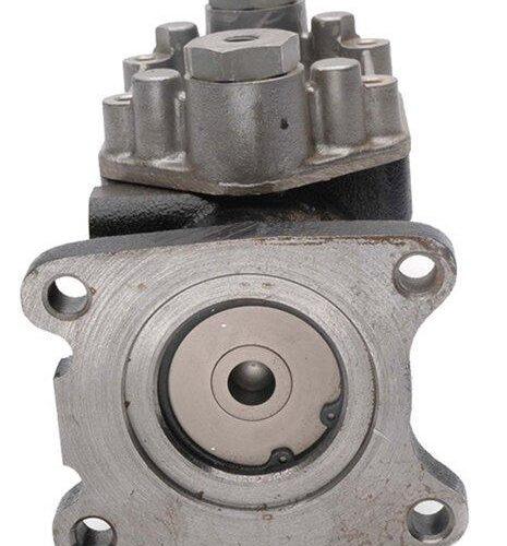 Oil pump component with bolts and fittings.