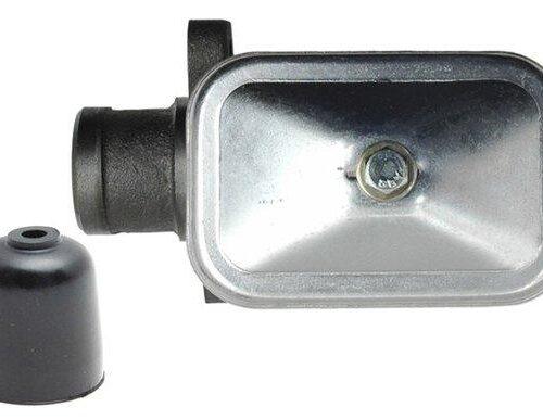 Automotive part with black cap attachment.