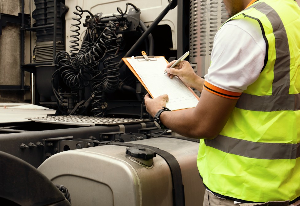 Texas DPS certified mechanic performing a commercial DOT truck inspection in Kirby TX.